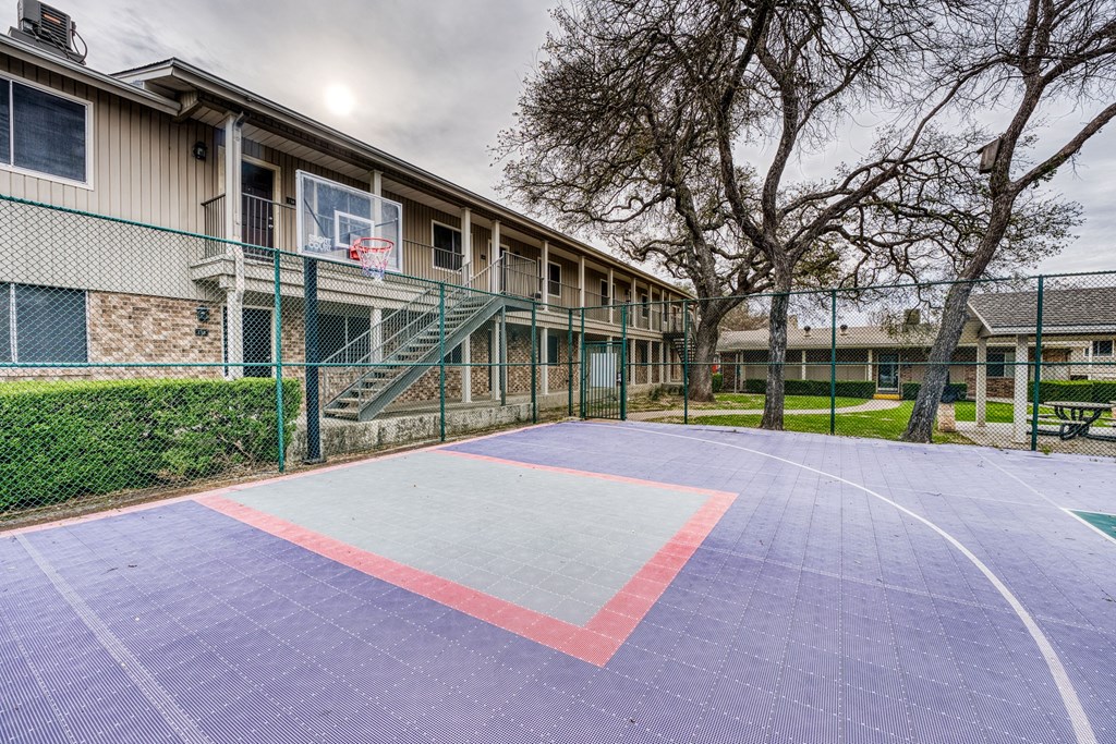 a basketball court at Juniper Springs Apartments, Austin, TX